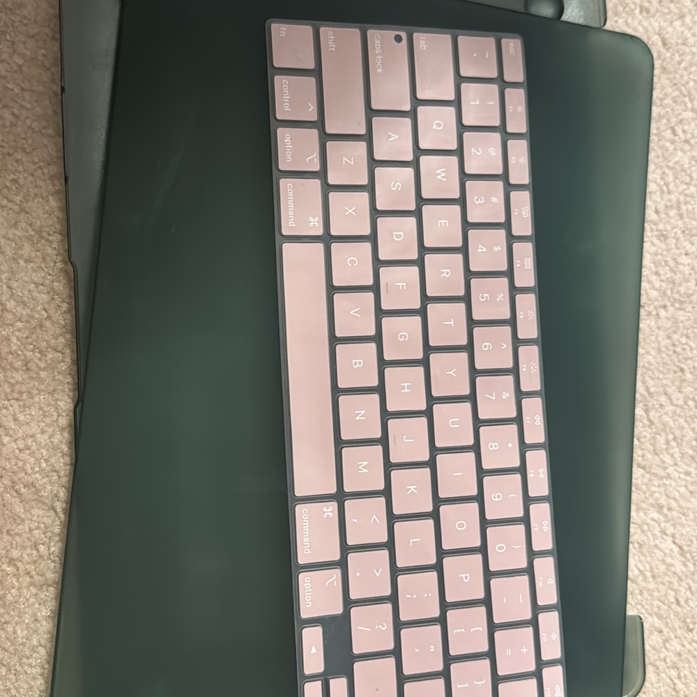 Apple Keyboard with Pink Cover and Green Case